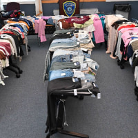 The suspects made off with more than $2,000 worth of merchandise, according to the police.