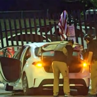 Manhunt underway after car rammed into FBI office in Pittsburgh in 'terrorist' incident
