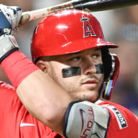 Mike Trout prepares to hit a baseball