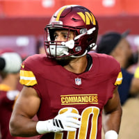LANDOVER, MARYLAND - AUGUST 18: Austin Ekeler #30 of the Washington Commanders warms up before the game against the Cincinnati Bengals during the NFL Preseason 2025 game at Northwest Stadium on August 18, 2025 in Landover, Maryland. (Photo by G Fiume/Getty Images)