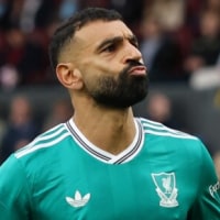 BURNLEY, ENGLAND - SEPTEMBER 14: Mohamed Salah of Liverpool celebrates scoring his team's first goal from the penalty spot during the Premier League match between Burnley and Liverpool at Turf Moor on September 14, 2025 in Burnley, England. (Photo by Stu Forster/Getty Images)