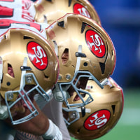 SEATTLE, WASHINGTON - OCTOBER 10: San Francisco 49ers and Seattle Seahawks helmets are seen at the line of scrimmage at Lumen Field on October 10, 2024 in Seattle, Washington. (Photo by Robin Alam/ISI Photos/Getty Images)