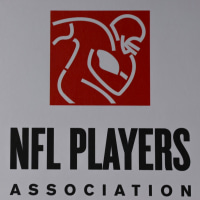 CANTON, OHIO - AUGUST 24: A detail of the NFL Players Association logo on August 24, 2025 in Canton, Ohio. (Photo by Aaron M. Sprecher/Getty Images)