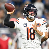 Sep 14, 2025; Detroit, Michigan, USA; Chicago Bears quarterback Caleb Williams (18) passes the ball against the Detroit Lions during the first quarter of the game at Ford Field. Mandatory Credit: Lon Horwedel-Imagn Images