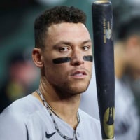 Sep 3, 2025; Houston, Texas, USA; New York Yankees designated hitter Aaron Judge (99) stands in the dugout during the second inning against the Houston Astros at Daikin Park. Mandatory Credit: Troy Taormina-Imagn Images