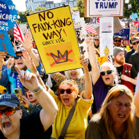 Crowd cheers during the "No Kings" rally on Boston Common on Oct. 18, 2025.