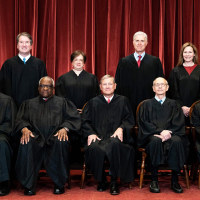 Seated from left: Associate Justice Samuel Alito, Associate Justice Clarence Thomas, Chief Justice John Roberts, Associate Justice Stephen Breyer and Associate Justice Sonia Sotomayor, standing from left: Associate Justice Brett Kavanaugh, Associate Justice Elena Kagan, Associate Justice Neil Gorsuch and Associate Justice Amy Coney Barrett.