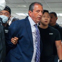 Brad Lander under arrest by Immigration and Customs Enforcement (ICE) and FBI agents outside federal immigration court.