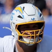 Sep 28, 2025; East Rutherford, New Jersey, USA; Los Angeles Chargers offensive tackle Joe Alt (76) blocks against New York Giants linebacker Abdul Carter (51) during the first quarter at MetLife Stadium. Mandatory Credit: Brad Penner-Imagn Images