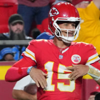 Oct 12, 2025; Kansas City, Missouri, USA; Kansas City Chiefs quarterback Patrick Mahomes (15) reacts after a touchdown against the Detroit Lions during the first half at GEHA Field at Arrowhead Stadium. Mandatory Credit: Denny Medley-Imagn Images