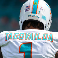 MIAMI GARDENS, FLORIDA - OCTOBER 12: Tua Tagovailoa #1 of the Miami Dolphins warms up prior to an NFL football game against the Los Angeles Chargers at Hard Rock Stadium on October 12, 2025 in Miami Gardens, Florida. (Photo by Perry Knotts/Getty Images)