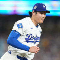 Oct 28, 2025; Los Angeles, California, USA; Los Angeles Dodgers two-way player Shohei Ohtani (17) reacts after throwing to first for an out against Toronto Blue Jays third baseman Addison Barger (47) in the sixth inning during game four of the 2025 MLB World Series at Dodger Stadium. Mandatory Credit: Kirby Lee-Imagn Images