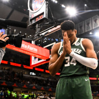 Oct 12, 2025; Chicago, Illinois, USA;  Milwaukee Bucks forward Giannis Antetokounmpo (34) prays before the first half against the Chicago Bulls at the United Center. Mandatory Credit: Matt Marton-Imagn Images