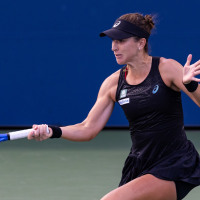 Aug 24, 2025; Flushing, NY, USA; Belinda Bencic of Switzerland in action against Zhang Shuai of China in the first round of the womenÕs singles at the US Open at Billie Jean King National Tennis Centre. Mandatory Credit: Mike Frey-Imagn Images