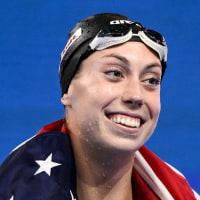 Gretchen Walsh of United States of America reacts after winning the gold medal in the swimming 50m Butterfly Women Final during the 22nd World Aquatics Championships at the WAC Arena. Singapore (Singapore), August 2nd, 2025 (Photo by DBM/Insidefoto/Mondadori Portfolio via Getty Images)