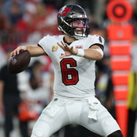 Oct 12, 2025; Tampa, Florida, USA; Tampa Bay Buccaneers quarterback Baker Mayfield (6) throws downfield during the fourth quarter against the San Francisco 49ers at Raymond James Stadium. Mandatory Credit: Nathan Ray Seebeck-Imagn Images
