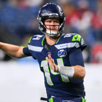 Oct 20, 2025; Seattle, Washington, USA; Seattle Seahawks quarterback Sam Darnold (14) warms up prior to the game against the Houston Texans at Lumen Field. Mandatory Credit: Steven Bisig-Imagn Images
