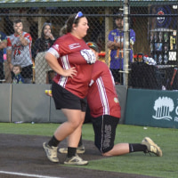 Nicole Colley walked past her own proposal during a softball game. 