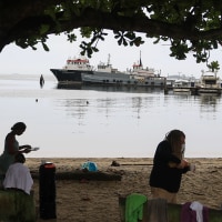 People along the Gulf of Paria in Port of Spain, Trinidad and Tobago.