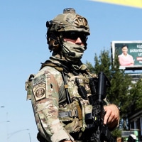 Masked US Customs and Border Protection (CBP) Border Patrol agents.