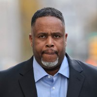 Former NBA player and coach Damon Jones arrives for his arraignment