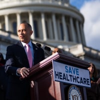 House Minority Leader Hakeem Jeffries conducts a rally at the Capitol to oppose the Senate-passed spending bill that would reopen the government because it does not extend the the Affordable Care Act tax credits.