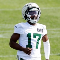 Kris Boyd runs on the football field