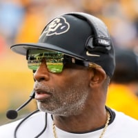 Nov 8, 2025; Morgantown, West Virginia, USA; Colorado Buffaloes head coach Deion Sanders walks along the sidelines late in the fourth quarter against the West Virginia Mountaineers at Milan Puskar Stadium. Mandatory Credit: Ben Queen-Imagn Images