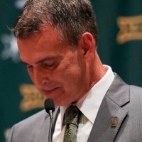 Jul 18, 2016; Dallas, TX, USA; Baylor Bears new athletic director Mack Rhoades reacts at a press conference during the Big 12 Media Days at Omni Dallas Hotel. Mandatory Credit: Kevin Jairaj-USA TODAY Sports