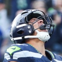 Nov 9, 2025; Seattle, Washington, USA; Seattle Seahawks running back Zach Charbonnet (26) celebrates after scoring a touchdown during the second quarter against the Arizona Cardinals at Lumen Field. Mandatory Credit: Kevin Ng-Imagn Images
