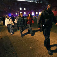 Brown University students are escorted by police