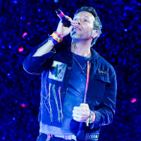 Image: Chris Martin of Coldplay performs on a stop of the band's Music of the Spheres world tour