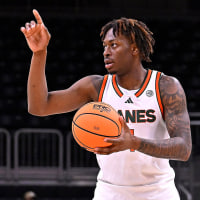 Marcus Allen signals to teammates as the Miami Hurricanes faced the Delaware State Hornets on Nov. 23, 2025.