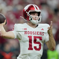 Dec 6, 2025; Indianapolis, IN, USA; Indiana Hoosiers quarterback Fernando Mendoza (15) passes against the Ohio State Buckeyes in the first quarter during the 2025 Big Ten championship game at Lucas Oil Stadium. Mandatory Credit: Aaron Doster-Imagn Images