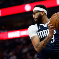 DALLAS, TX - DECEMBER 12: Anthony Davis #3 of the Dallas Mavericks rebounds against the Brooklyn Nets in the first half at American Airlines Center on December 12, 2025 in Dallas, Texas. NOTE TO USER: User expressly acknowledges and agrees that, by downloading and or using this photograph, User is consenting to the terms and conditions of the Getty Images License Agreement. (Photo by Ron Jenkins/Getty Images)