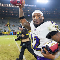 GREEN BAY, WISCONSIN - DECEMBER 27: Derrick Henry #22 of the Baltimore Ravens celebrates after an NFL football game against the Green Bay Packers at Lambeau Field on December 27, 2025 in Green Bay, Wisconsin. (Photo by Todd Rosenberg/Getty Images)