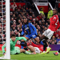 MANCHESTER, ENGLAND - DECEMBER 15: Antoine Semenyo of AFC Bournemouth scores his team's first goal during the Premier League match between Manchester United and Bournemouth at Old Trafford on December 15, 2025 in Manchester, England. (Photo by Carl Recine/Getty Images)