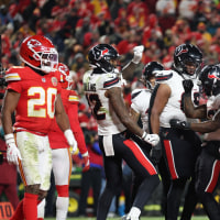 KANSAS CITY, MISSOURI - DECEMBER 07: Dare Ogunbowale #33 of the Houston Texans celebrates with teammates after scoring a rushing touchdown against the Kansas City Chiefs during the fourth quarter at Arrowhead Stadium on December 07, 2025 in Kansas City, Missouri. (Photo by Jamie Squire/Getty Images)