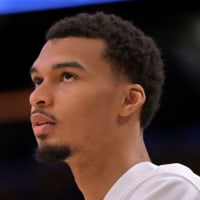 Dec 10, 2025; Los Angeles, California, USA;  San Antonio Spurs forward Victor Wembanyama (1) reacts after a basket during the first half against the Los Angeles Lakers at Crypto.com Arena. Mandatory Credit: Jayne Kamin-Oncea-Imagn Images