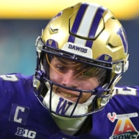 Dec 13, 2025; Inglewood, CA, USA;  Washington Huskies quarterback Demond Williams Jr. (2) is forced out of bounds by Boise State Broncos defensive back Jeremiah Earby (6) after a catching a pass in the second half of the LA Bowl at SoFi Stadium. Mandatory Credit: Jayne Kamin-Oncea-Imagn Images