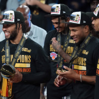 Dec 16, 2025; Las Vegas, Nevada, USA; New York Knicks guard Jalen Brunson (11) poses with the most valuable player trophy after victory over the San Antonio Spurs during the Emirates NBA Cup Final at T-Mobile Arena. Mandatory Credit: Kirby Lee-Imagn Images