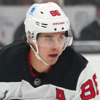 Nov 1, 2025; Los Angeles, California, USA; New Jersey Devils center Jack Hughes (86) skates with the puck against the Los Angeles Kings in the first period at Crypto.com Arena. Mandatory Credit: Kirby Lee-Imagn Images