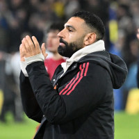 LEEDS, ENGLAND - DECEMBER 06: (THE SUN OUT, THE SUN ON SUNDAY OUT) Mohamed Salah of Liverpool looks dejected as he walks off the pitch after the final whistle alongside Liverpool Manager, Arne Slot following his team's draw in the Premier League match between Leeds United and Liverpool at Elland Road on December 06, 2025 in Leeds, England. (Photo by Liverpool FC/Liverpool FC via Getty Images)