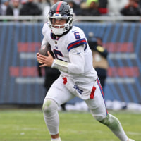 Nov 9, 2025; Chicago, Illinois, USA; New York Giants quarterback Jaxson Dart (6) rushes the ball against the Chicago Bears during the second half at Soldier Field. Mandatory Credit: Mike Dinovo-Imagn Images