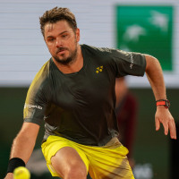 May 26, 2024; Paris, France; Stan Wawrinka of Switzerland returns a shot during his match against Andy Murray of Great Britain on day one of Roland Garros at Stade Roland Garros. Mandatory Credit: Susan Mullane-USA TODAY Sports