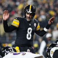 Pittsburgh Steelers quarterback Aaron Rodgers tries to quiet the crowd during a game against the Baltimore Ravens on Jan. 4, 2026.