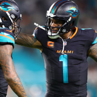 MIAMI GARDENS, FLORIDA - SEPTEMBER 29: Darren Waller #83 and Tua Tagovailoa #1 of the Miami Dolphins celebrate after a touchdown  during the second half of the game against the New York Jets at Hard Rock Stadium on September 29, 2025 in Miami Gardens, Florida. (Photo by Megan Briggs/Getty Images)