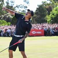 Aces GC player Anthony Kim from the U.S. reacts as he claims the title on the final day of the LIV Golf Adelaide tournament at The Grange Golf Club in Adelaide on February 15.
