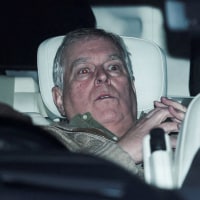 Andrew Mountbatten Windsor seen inside of a car