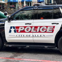 A City of Allen police car parked outside.
